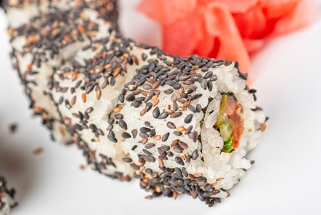 Closeup of Sushi rolls at plate with sesameの写真素材