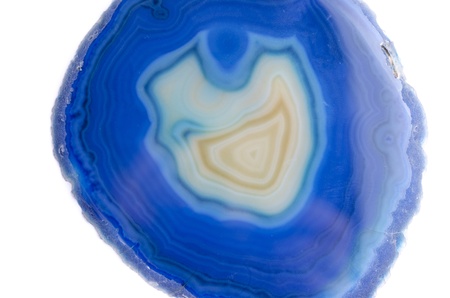 Close up of slice of agate stone on a whiteの写真素材