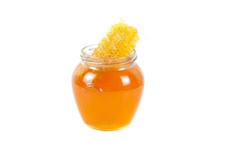 jar of organic honey on white backgroundの写真素材