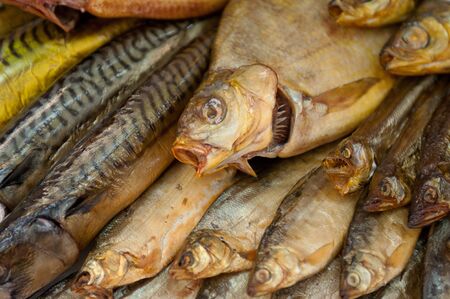 Fish shop  closeup of smoked fishの写真素材