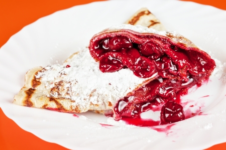 pancakes with sweet cherry sauceの写真素材