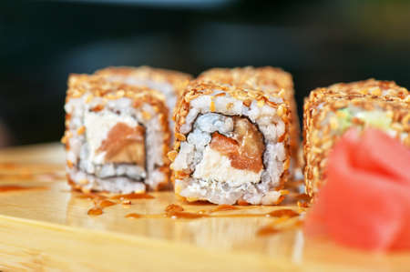 Japanese cuisine - sesame sushi rolls with syrupの写真素材