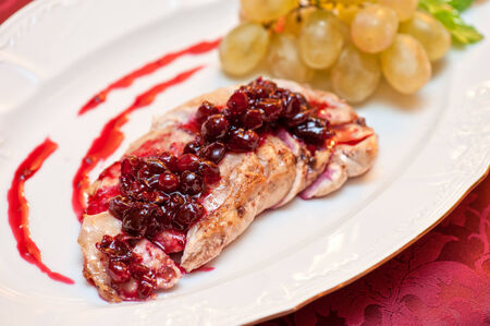 chicken breast meat with cranberry sauceの写真素材