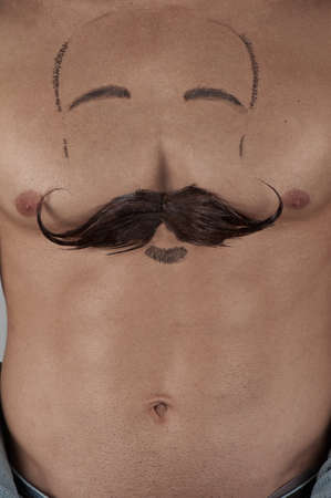 male torso with moustache and beard at chestの写真素材