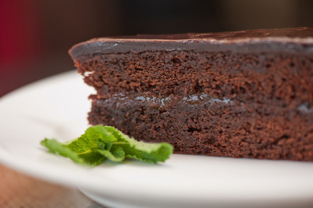 tasty piece of chocolate cake closeupの写真素材