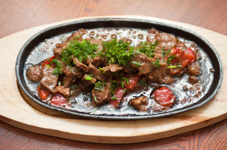 meat with vegetables at frying panの写真素材