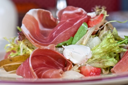 Green salad with cheese and baconの写真素材