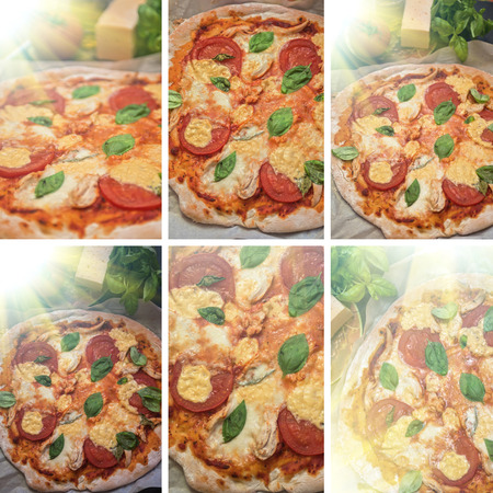 rustic italian pizza with mozzarella cheese tomato and basil leavesの写真素材
