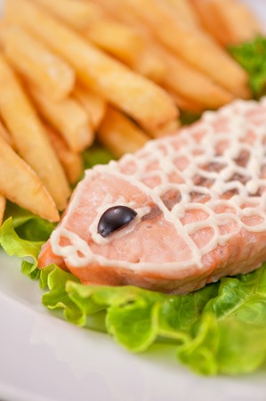 Trout fish with fried potatoの写真素材