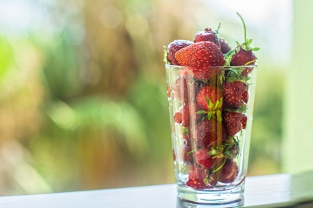 Fresh ripe strawberry in a glassの写真素材