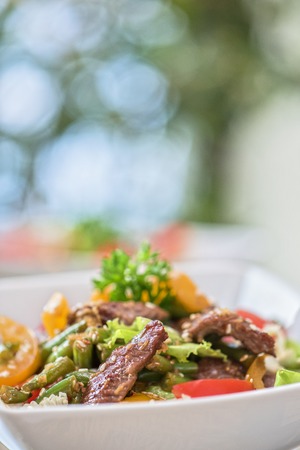 Warm salad with veal closeupの写真素材