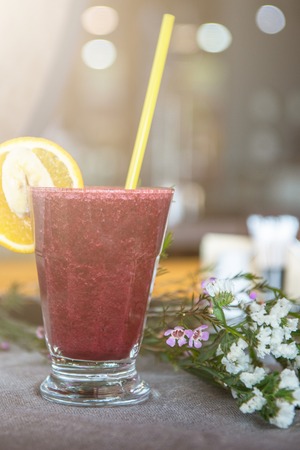 Fresh fruit smoothie from blueberry banana and orange juiceの写真素材