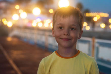Kid boy walking at Alania beach, Turkeyの写真素材