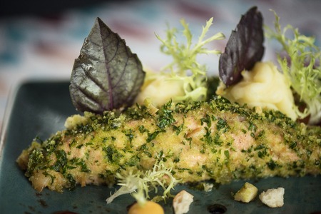 Baked salmon fish with potatoの写真素材