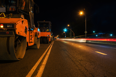 repairing the road in the night cityの写真素材
