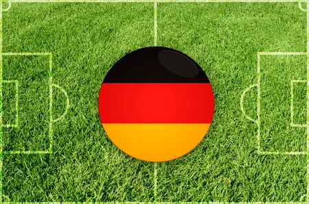 Germany icons at football field backgroundの写真素材