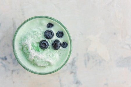 Blueberry smoothie on a whiteの写真素材