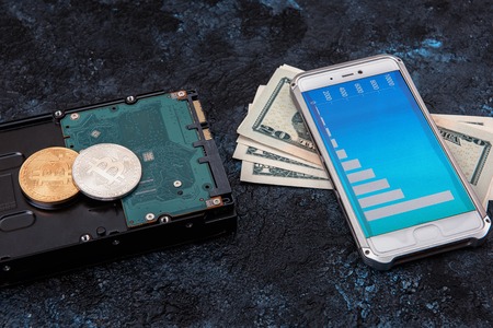 Bitcoin coin with HDDの写真素材