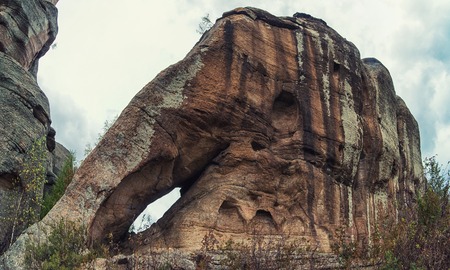 Bizarre forms of weathering of coastal rocks (elephant) , at the Kolyvan lake - a lake at the foot of the northern slope of the Kolyvan Ridge in the Altai Territory of Russiaの写真素材