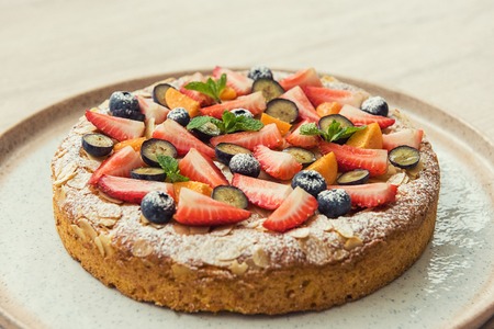 Sweet bright cakes with fruit and berriesの写真素材