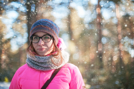 beautiful woman portrait in a winter forestの写真素材