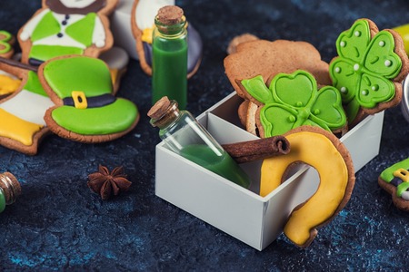 Gingerbreads cookies for Patricks day on black concrete backgroundの写真素材
