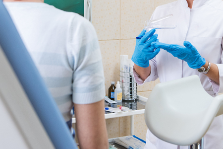 Closeup of doctor gynecologist accepts the patientの写真素材