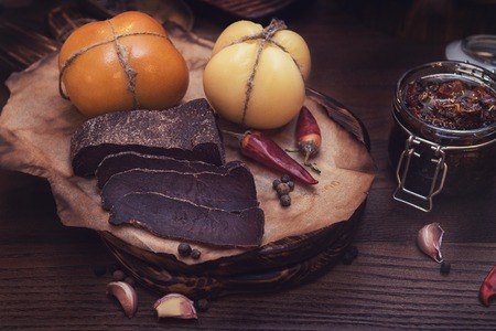 Beef jerky on wooden backgroundの写真素材