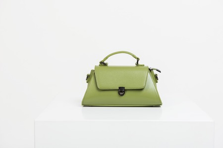 Green fashion female handbag on white backgroundの写真素材
