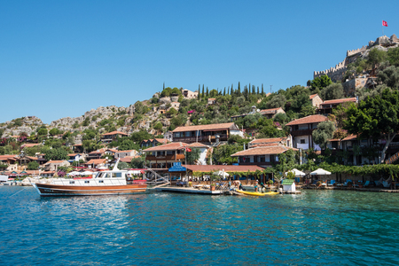 Kekova island, Turkey - July, 2015: Cafe at sea coast, near ruins of the ancient city on the Kekova island, Turkeyのeditorial素材