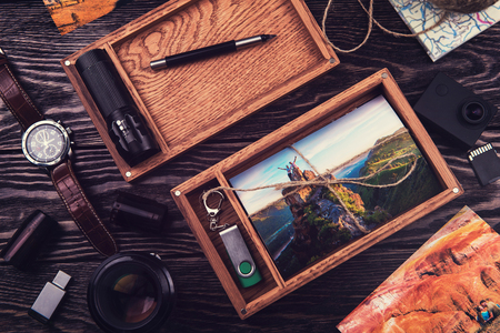 Wooden photo box with photo from travel. Decorated with different things. Travel concept.の写真素材