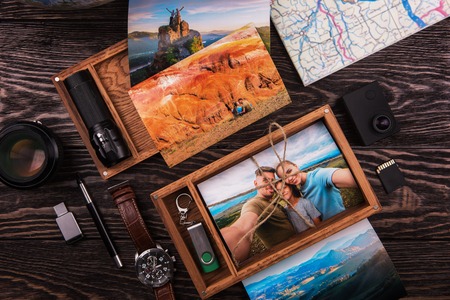 Wooden photo box with photo from travel. Decorated with different things. Travel concept.の写真素材