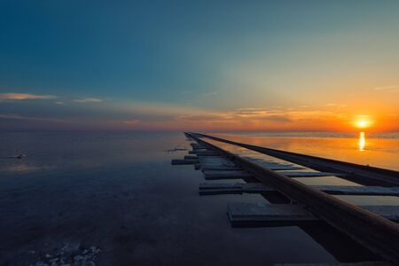 Beauty sunset on salty lake in Altay, Siberia, Russia