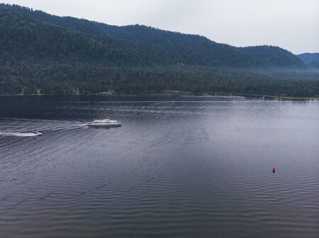 Aerial view on Teletskoye lake in Altai mountains, Siberia, Russia. Drone shot. Beauty panoramic...