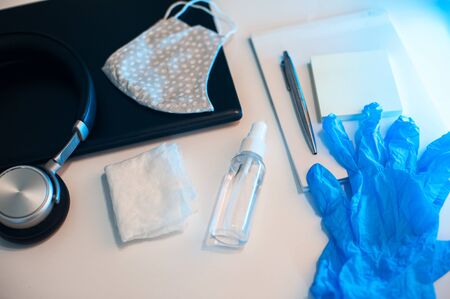 Sanitizer anti virus spray on the working table with laptop. Personal hygiene concept. Concept of...