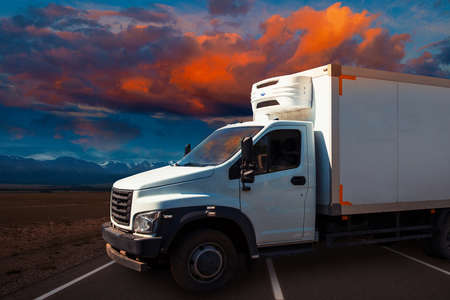 Refrigerated truck cargo transport on the mountain road in Altaiの写真素材