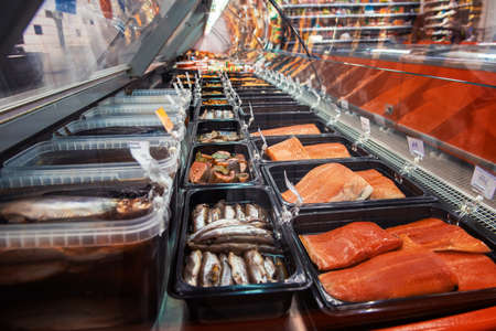 Fish and seafood stall in a market. Healthy eating and fish market conceptの写真素材