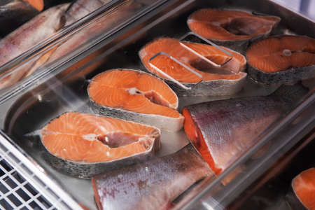 Fish and seafood stall in a marketの写真素材