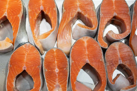 Salmon steaks fish closeup in a marketの写真素材