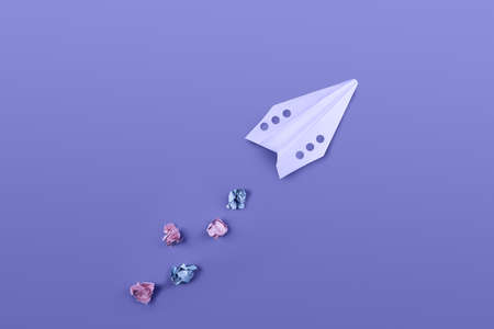 Paper plane colored in trendy violet colorの写真素材