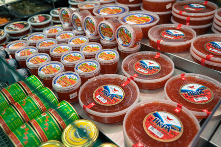 Salted granular red caviar at fish market with priceのeditorial素材