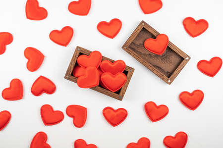 Valentine day white wood background with gift box with red hearts