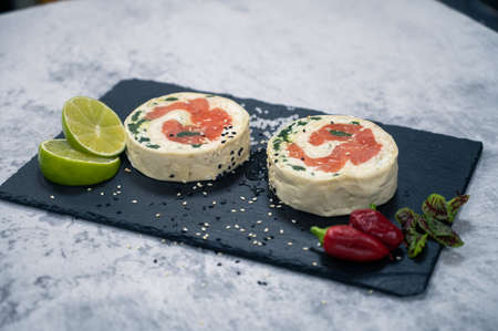 Salmon roll with mozzarellaの写真素材