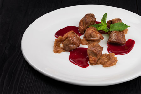 Pork meat with berries sauceの写真素材