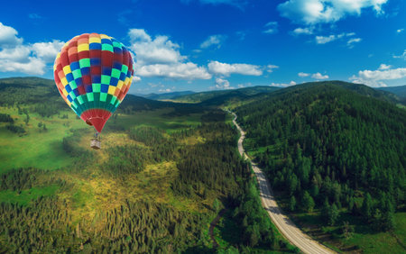 Hot air balloons floating up to the skyの写真素材