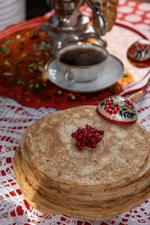Russian pancake blini with berries and sour creamの写真素材
