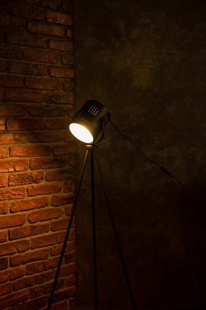 Vintage rustic lamp fixed on tripodの写真素材