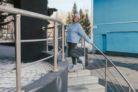 Portrait of a stylish woman in blue jacketの写真素材
