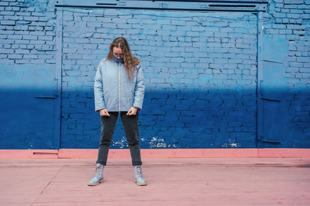 Portrait of a stylish woman in blue jacketの写真素材