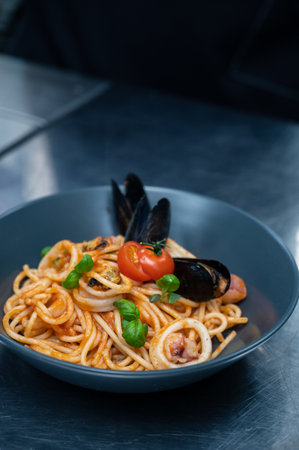 Seafood Pasta with mussels with basil and tomatoの写真素材